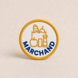 Badge Marchand à scratcher